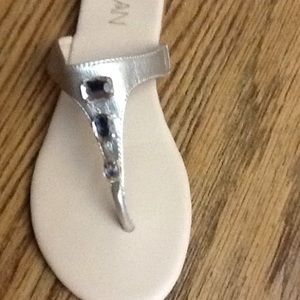 NWT Iman gold thong with 3 gold rhinestones